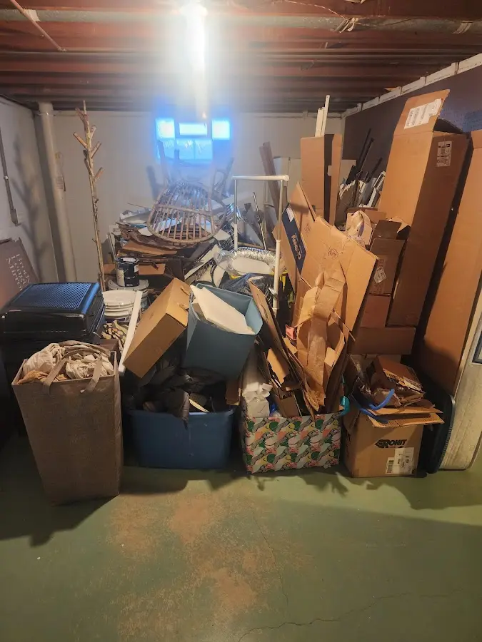 Roll-off dumpster container at job site for Yard Waste Dumpster Rental in Lake Luzerne